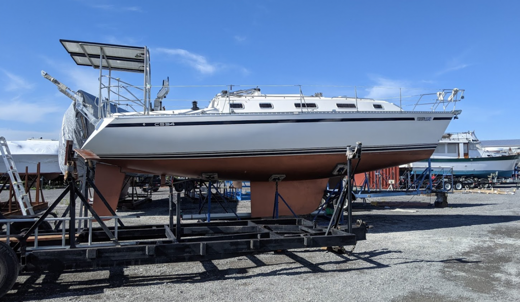 CS34 sailboat in boat yard on cradle