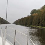 sailboat-motoring-up-murray-canal-fall